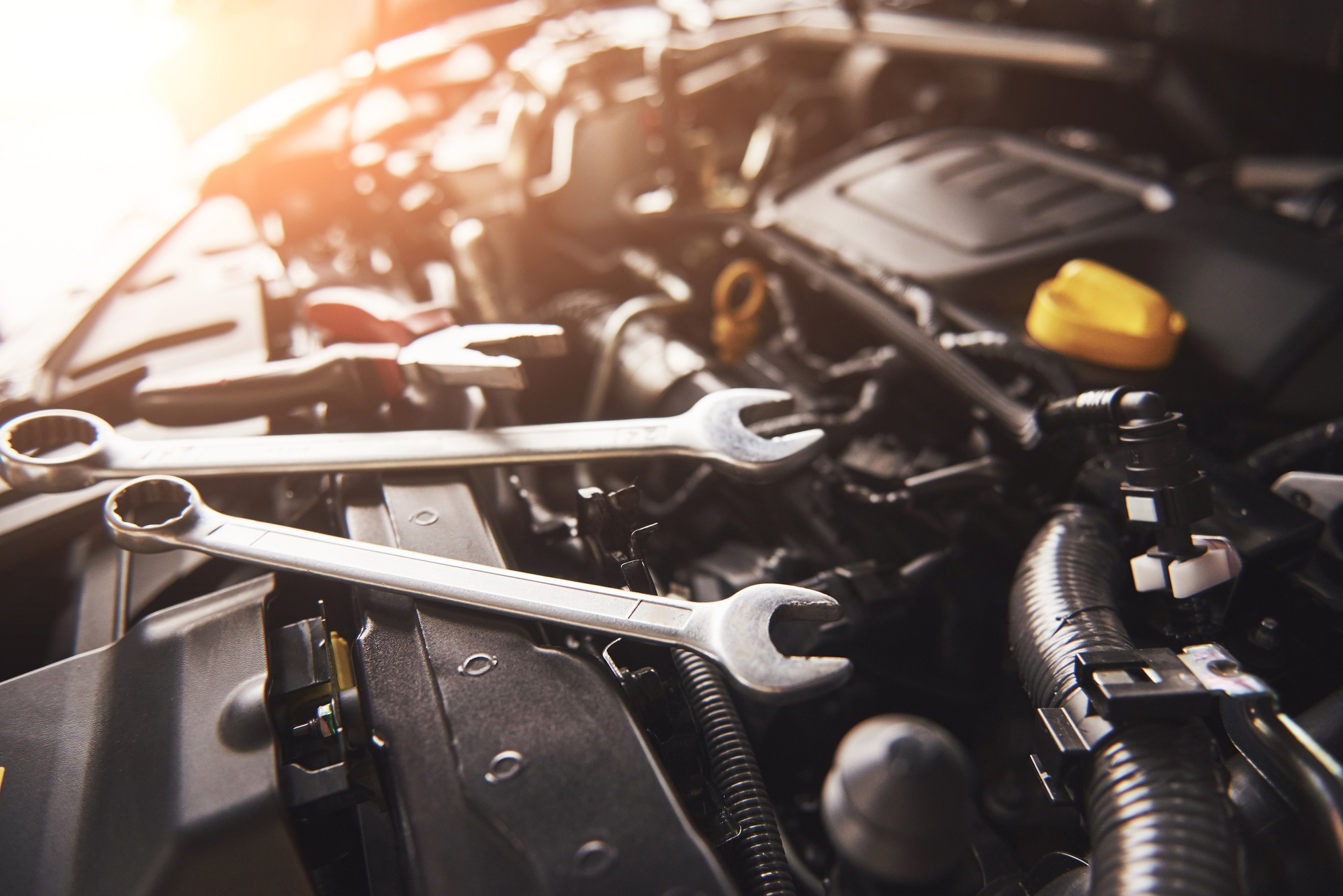Tools spread out over engine bay